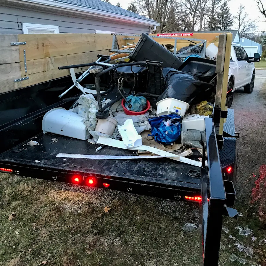 Roll-off dumpster delivered to a residential driveway in Kokomo